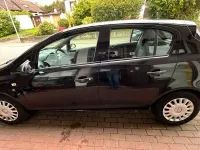 Second-hand Opel Corsa 80 CP (58 kW) 2009 Negru Hatchback