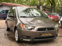 Gebraucht Mitsubishi Colt Edition 95 PS (69 kW) 2011 Braun Kleinwagen