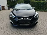 Gebraucht Hyundai i40 Edition 135 PS (99 kW) 2014 Phantom black / mic Kombi