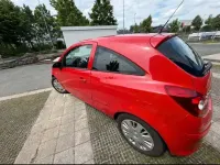 Gebraucht Opel Corsa 60 PS (44 kW) 2007 Rot Kleinwagen