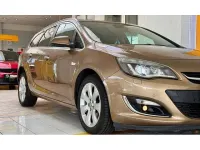 Używany Opel Astra 140 KM (102 kW) 2013 Brązowy Kombi