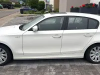 Używany BMW 116 122 KM (89 kW) 2011 Biały Hatchback