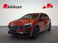 Gebraucht BMW 220 Active Tourer Luxury Line 192 PS (141 kW) 2019 Sunset orange metallic Van / Kleinbus