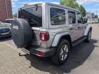 Gebraucht Jeep Wrangler Unlimited Sahara 200 PS (147 kW) 2021 Billet silver metalic SUV