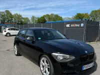 Używany BMW 116 136 KM (100 kW) 2011 Czarny Hatchback