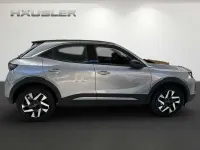 Gebraucht Opel Mokka Elegance 136 PS (100 kW) 2024 Kontrast grau (metallic) SUV