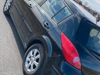Gebraucht Nissan Tiida 126 PS (92 kW) 2008 Schwarz Kleinwagen