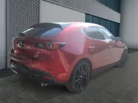 Używany Mazda 3 Exclusive 186 KM (136 kW) 2024 Czerwony Sedan/Limuzyna