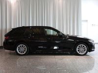 Gebraucht BMW 320e 163 PS (119 kW) 2023 Schwarz ii Kombi