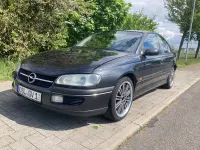 Second-hand Opel Omega 211 CP (155 kW) 1997 Negru Berlinǎ