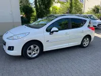 Gebraucht Peugeot 207 Premium 95 PS (69 kW) 2012 Weiß Kombi