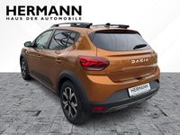 Gebraucht Dacia Sandero Expression 101 PS (74 kW) 2023 Taklamakanorange (orange) Kleinwagen