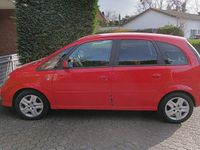 Second-hand Opel Meriva 90 CP (66 kW) 2010 Roșu Monovolum