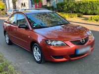 Używany Mazda 3 105 KM (77 kW) 2005 Czerwony Sedan/Limuzyna