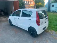 Gebraucht Daihatsu Cuore 70 PS (51 kW) 2010 Weiß Kleinwagen