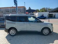 Gebraucht Ford Tourneo Courier Titanium 125 PS (91 kW) 2024 Grau Van / Kleinbus