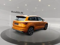 Gebraucht Skoda Karoq SportLine 150 PS (110 kW) 2023 Orange SUV