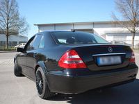 Second-hand Mercedes E200 122 CP (89 kW) 2005 Negru Berlinǎ