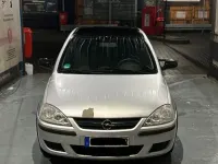 Używany Opel Corsa 70 KM (51 kW) 2004 Srebrny Hatchback