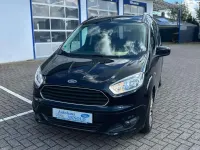 Gebraucht Ford Tourneo Courier Titanium 101 PS (74 kW) 2016 Iridiumschwarz metallic Van / Kleinbus