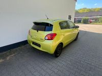 Gebraucht Mitsubishi Space Star 80 PS (58 kW) 2014 Gelb Van / Kleinbus