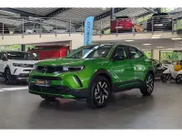Gebraucht Opel Mokka-e Elegance 100 kW (136 PS) 2024 Matcha grün (metallic) SUV