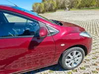 Używany Mazda 2 Center-Line 95 KM (69 kW) 2013 Czerwony Hatchback