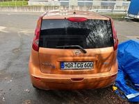Second-hand Nissan Note Acenta 88 CP (64 kW) 2009 Portocaliu Hatchback