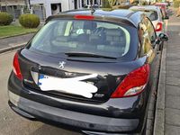 Gebraucht Peugeot 207 95 PS (69 kW) 2011 Schwarz Kleinwagen