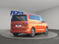 Gebraucht VW Multivan 204 PS (150 kW) 2023 Energetic orange metallic Van / Kleinbus