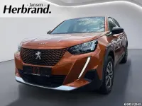 Gebraucht Peugeot e-2008 100 kW (136 PS) 2022 Orange SUV