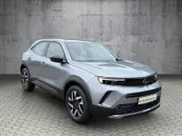 Gebraucht Opel Mokka 131 PS (96 kW) 2023 Kontrast grau SUV