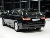 Gebraucht BMW 330e Advantage 184 PS (135 kW) 2020 Schwarz Kombi