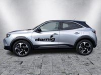 Gebraucht Opel Mokka-e Ultimate 114 kW (156 PS) 2024 Kontrast grau (metallic) SUV