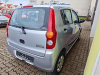 Gebraucht Daihatsu Cuore 69 PS (50 kW) 2009 Silber Kleinwagen
