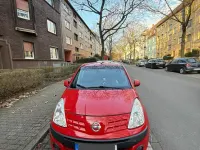 Gebraucht Nissan Pixo 68 PS (50 kW) 2012 Rot Kleinwagen