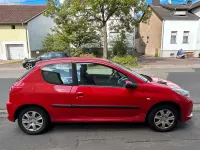 Gebraucht Peugeot 206+ 75 PS (55 kW) 2009 Rot Kleinwagen