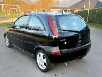 Second-hand Opel Corsa 58 CP (42 kW) 2003 Negru Hatchback