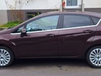 gebraucht Ford Fiesta 1,25 60kW Titanium Farbe: Morello