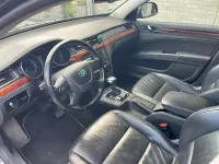 Używany Skoda Superb 170 KM (125 kW) 2012 Czarny Kombi
