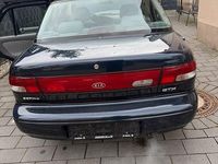 Second-hand Kia Sephia 80 CP (58 kW) 1996 Albastru Berlinǎ