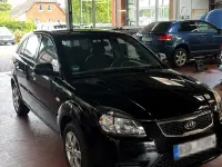 Gebraucht Kia Rio 95 PS (69 kW) 2010 Schwarz Kleinwagen