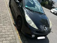 Gebraucht Peugeot 207 73 PS (53 kW) 2009 Schwarz Kleinwagen