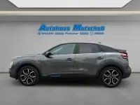 Gebraucht Citroën e-C4 Shine 100 kW (136 PS) 2023 Lackierung platiniumgrau/typ Limousine