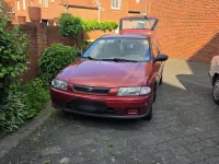 Gebraucht Mazda 323F 75 PS (55 kW) 1997 Rot Kleinwagen
