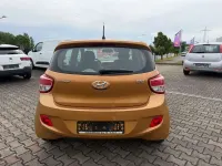 Gebraucht Hyundai i10 Classic 67 PS (49 kW) 2015 Mandarin orange/copper gold Kleinwagen