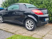 Używany Opel Tigra 90 KM (66 kW) 2007 Czarny Kabriolet