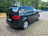 Gebraucht VW Touran 105 PS (77 kW) 2011 Schwarz Van / Kleinbus