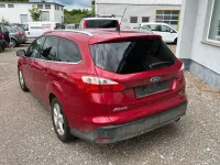 Gebraucht Ford Focus Titanium 182 PS (133 kW) 2011 Candyrot metallic Kombi