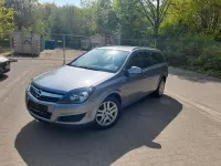 Używany Opel Astra 90 KM (66 kW) 2010 Srebrny Kombi